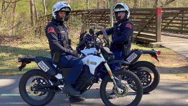 Two police officers on dirt bikes