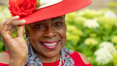 a woman with a red hat on