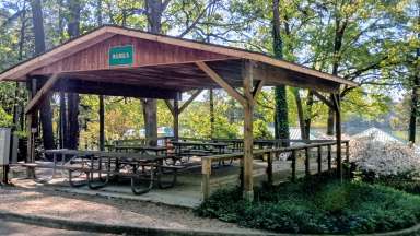 a shelter at lake wheeler park