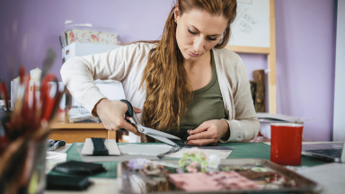 Woman working on vision board