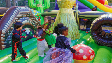 Kids playing on an inflatable