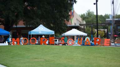 Moore Square sign on the Moore Square Lawn