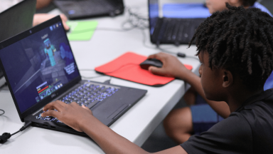 A child playing on a computer