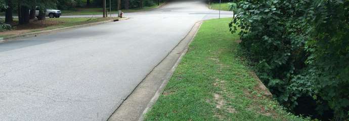 A photo of Churchill Road in Raleigh near the stormwater channel.