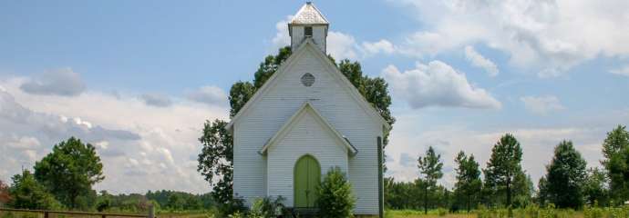 old church in a field in southeast raleigh