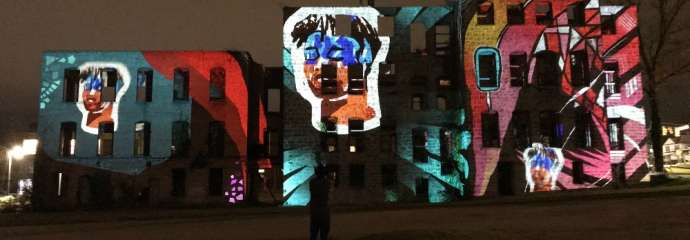 Art installation with projections on building
