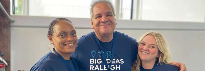 three City of Raleigh employees wearing t-shirts that say &quot;Big Ideas Raleigh&quot;