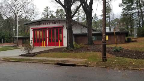 The new fire station 11 with big red doors that make easier for fire trucks to enter the station.