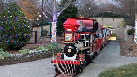 Holiday Express: Musical Water Snow Globe with Children Riding a Train