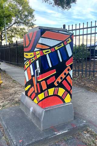 A signal box wrapped in public art by SJ Hall