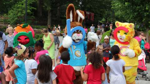 letter mascots and children at Pullen park