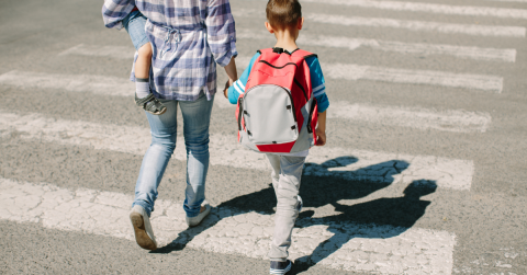 mom with kids at crosswalk