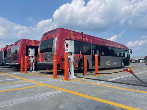 This shows electric GoRaleigh buses charging.