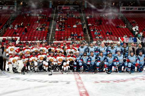 Hockey players at center ice