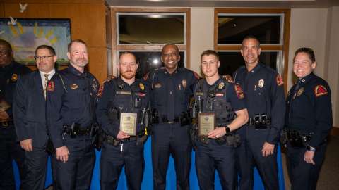 RPD officers group photo at nighttime event