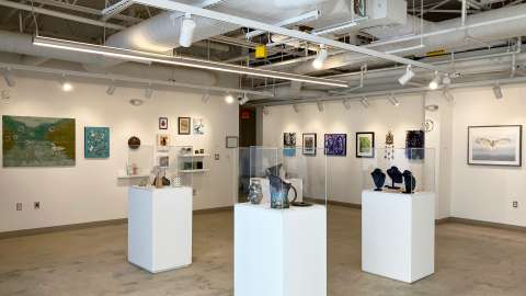 Previous community exhibition installed at Pullen featuring works in a variety of media, such as fibers, ceramics, painting and more