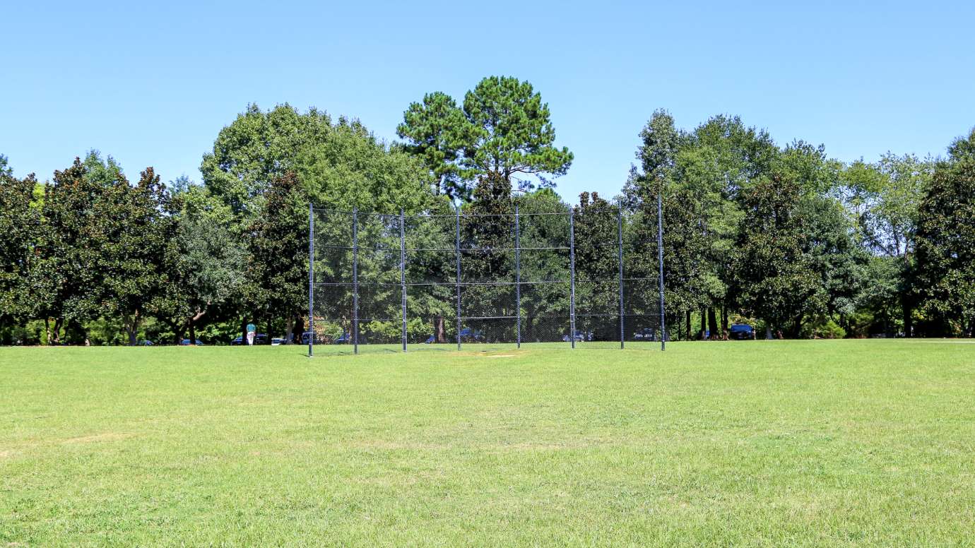 Field with batting cage at Anderson Point Park