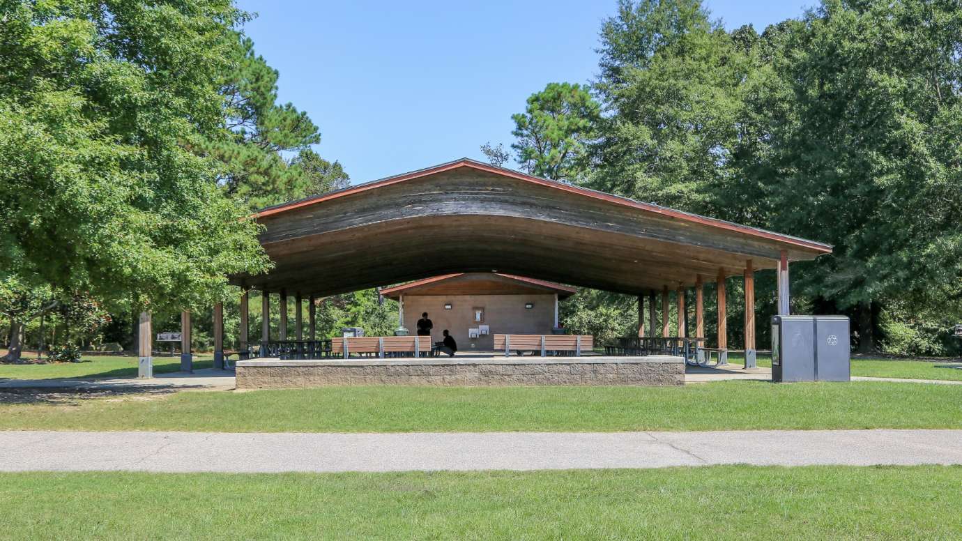Front view of large picnic shelter with bathrooms at Anderson Point Park