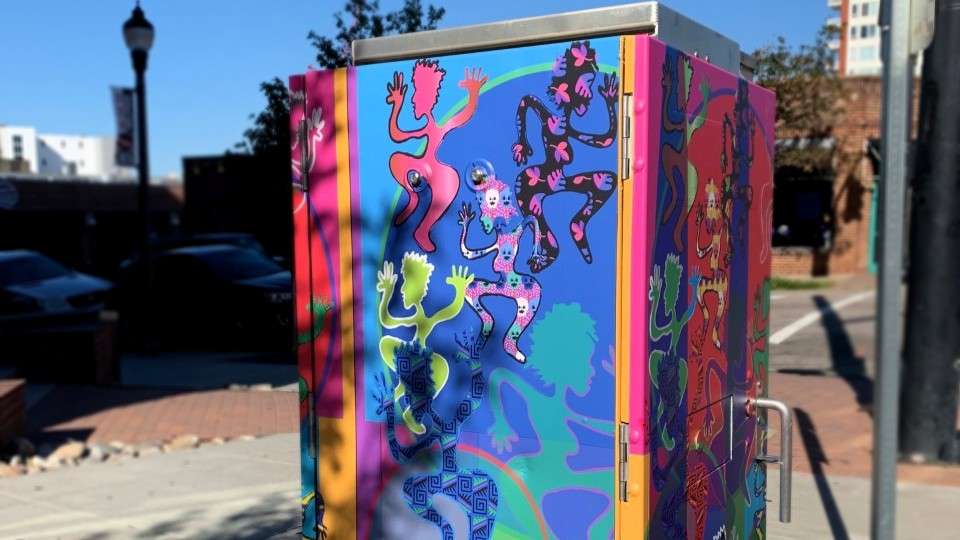 signal box wrapped in art by Jose Cruz