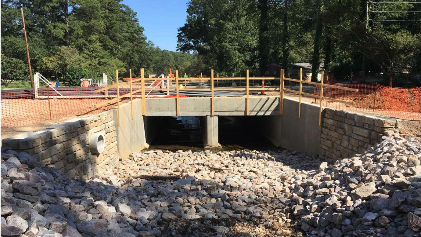 A new stone and concrete culvert on Swift Drive where water will flow through when it rains 