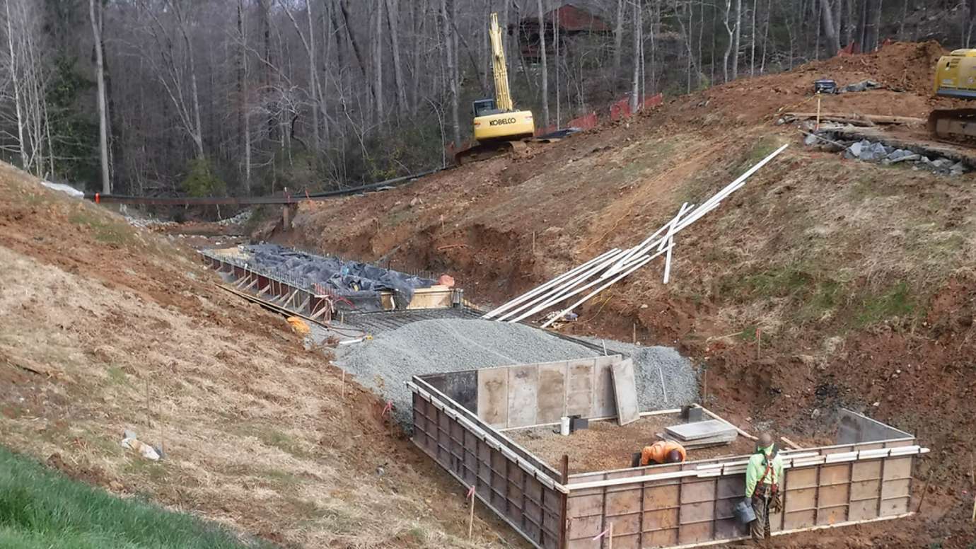 The construction of a new spillway at Laurel Hills Lake.
