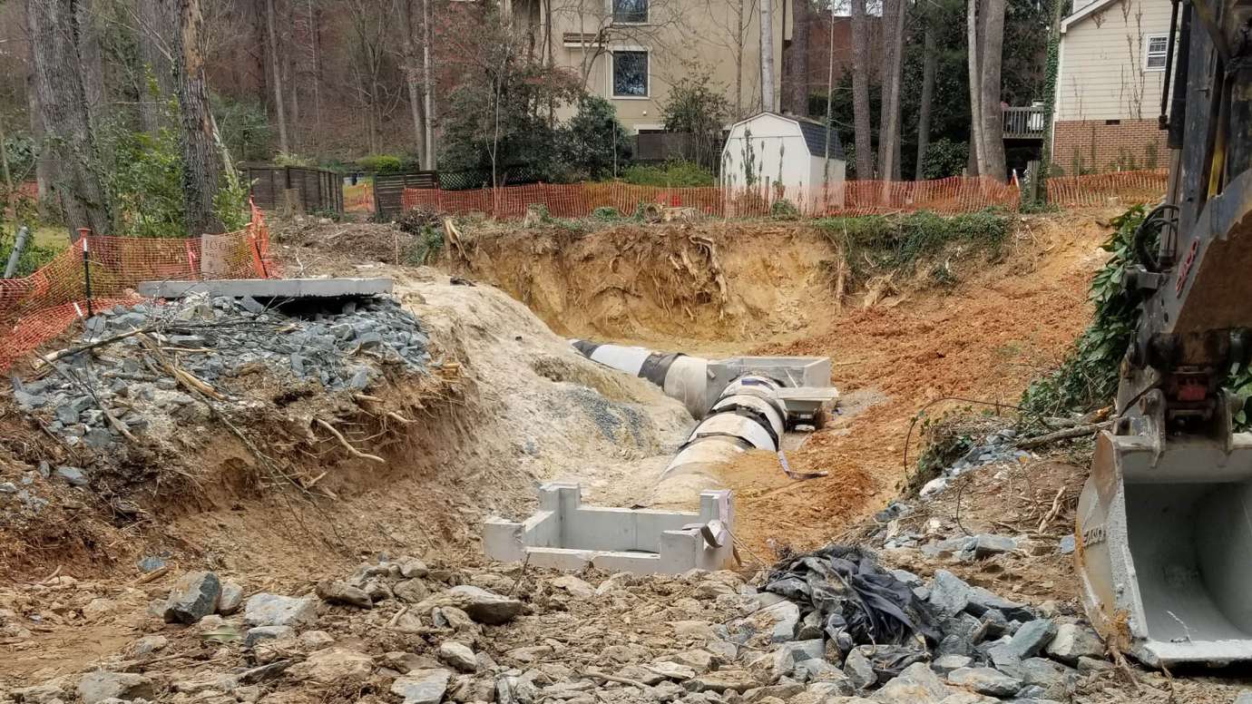 A new stormwater pipe under construction on Ramblewood Drive.
