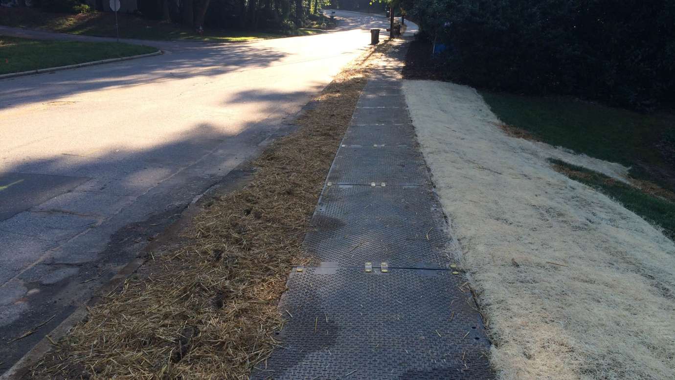 A temporary sidewalk that can be removed during construction. 