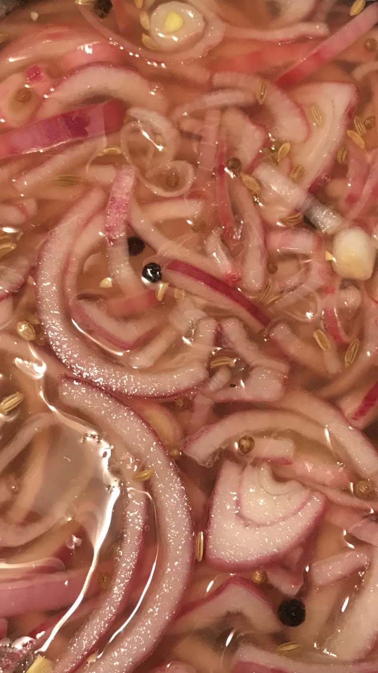 A close up photo of pickled onions by artist Ginger Wagg