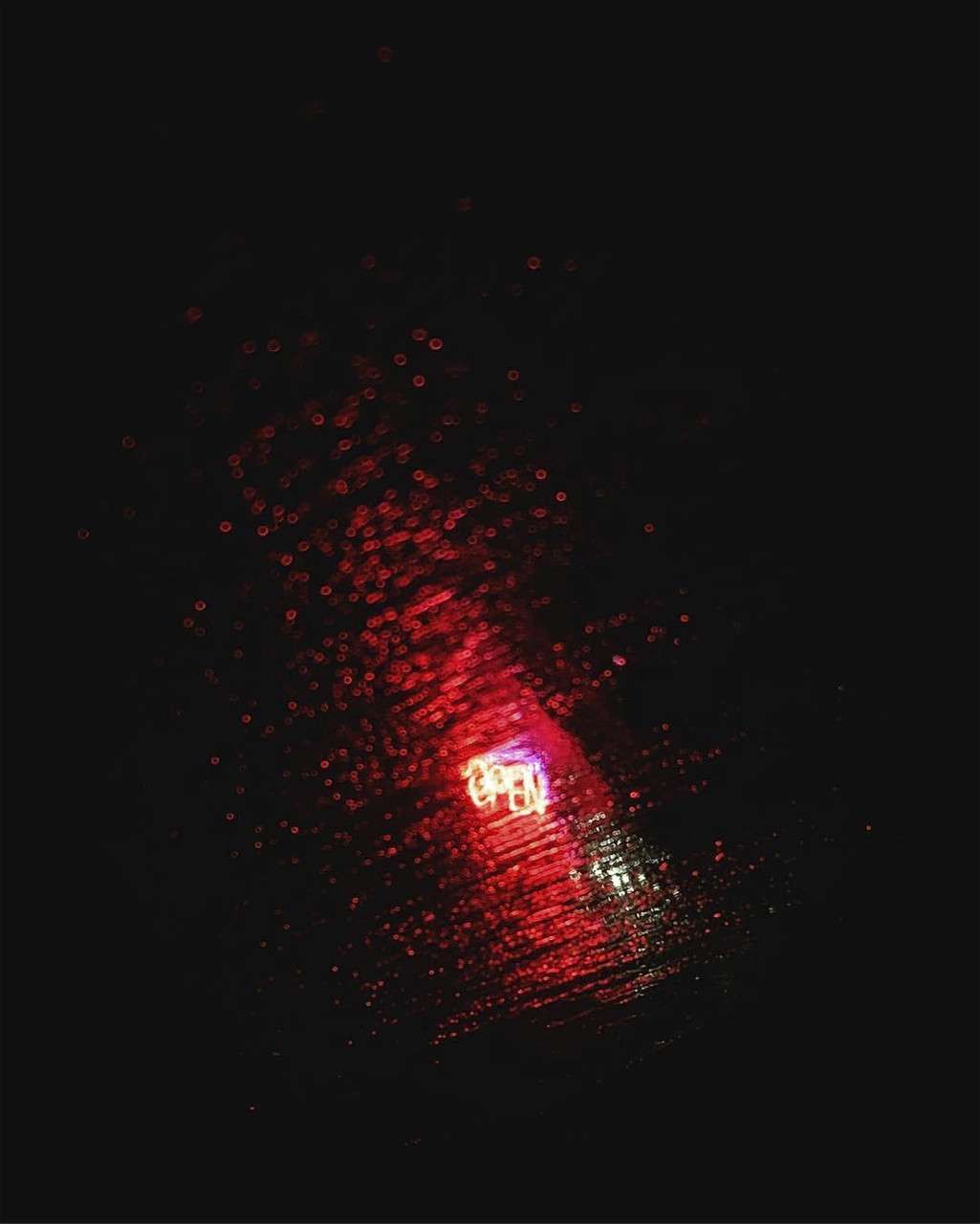 Archival inkjet prints on Canson Platine Fibre Rag by Lindsay Metivier, a glowing open light seen through wet glass