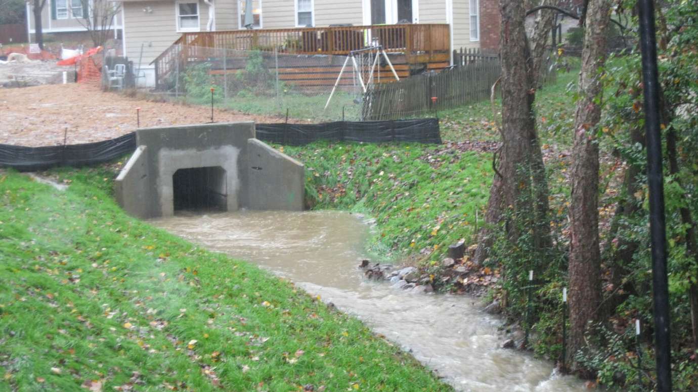 Stormwater flowing into a new box culvert on Rainwood Lane. 