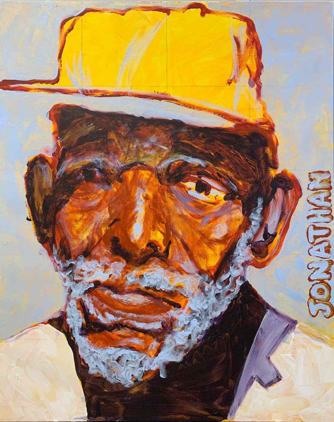  A Black man with a white beard wearing a yellow hat and white shirt