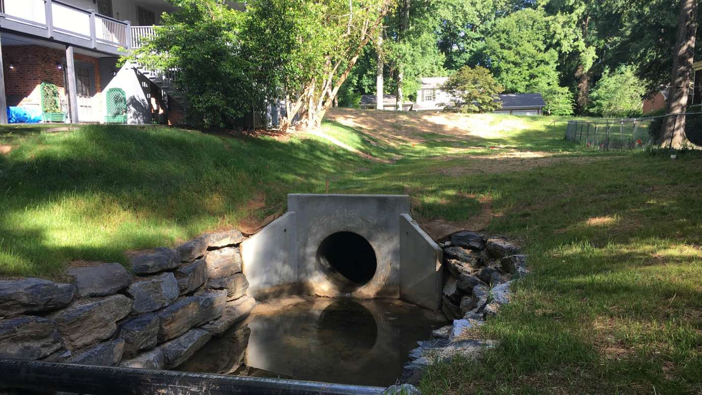 A new round, concrete stormwater pipe off of Audubon Drive