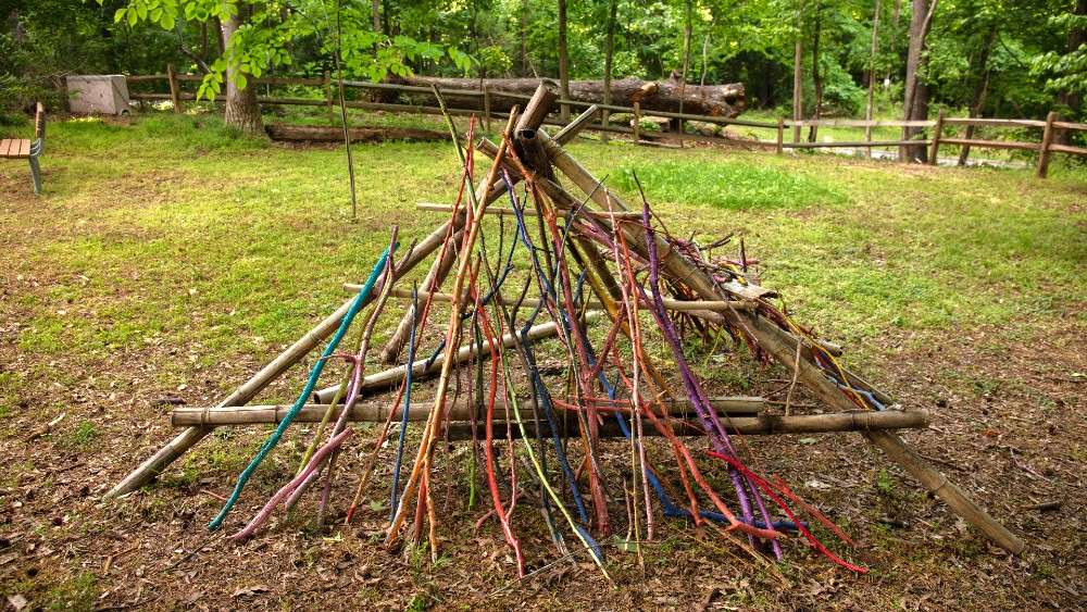 colorful wooden sticks arranged in pyramid