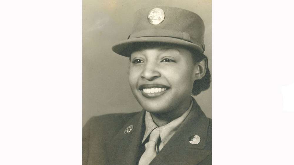 Historic headshot of woman in uniform