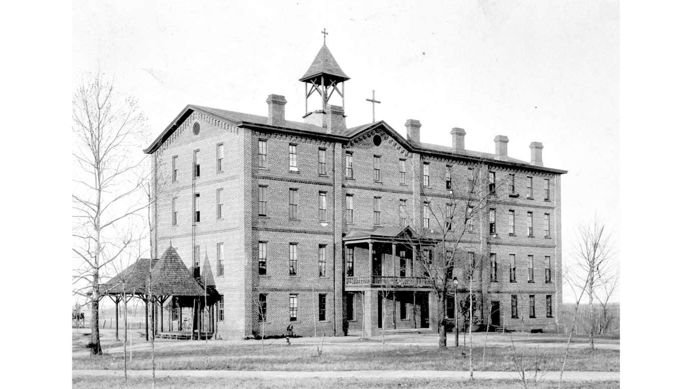 Old brick school building historic photo