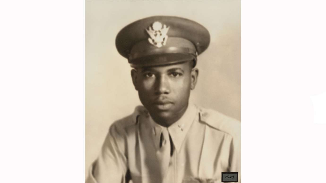 Historic headshot photo of man in Tuskegee Airman uniform