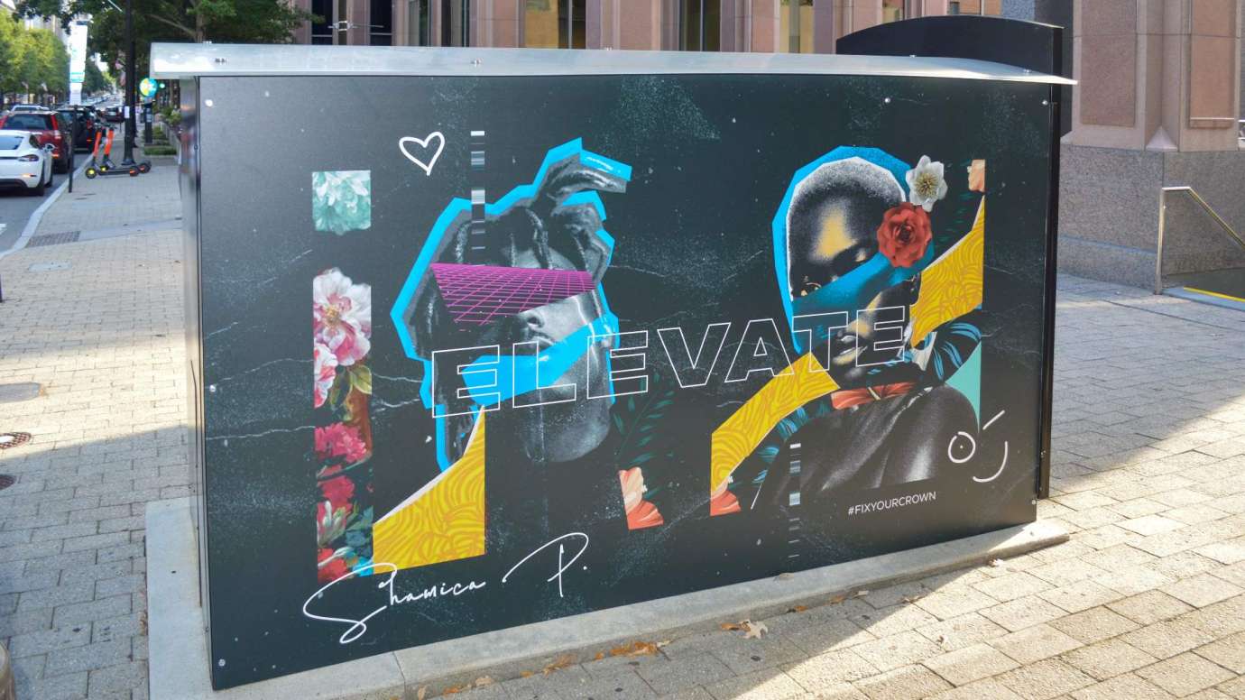Artwork on a news rack kiosk that features the word elevate and colorful lines and flowers across two peoples' faces