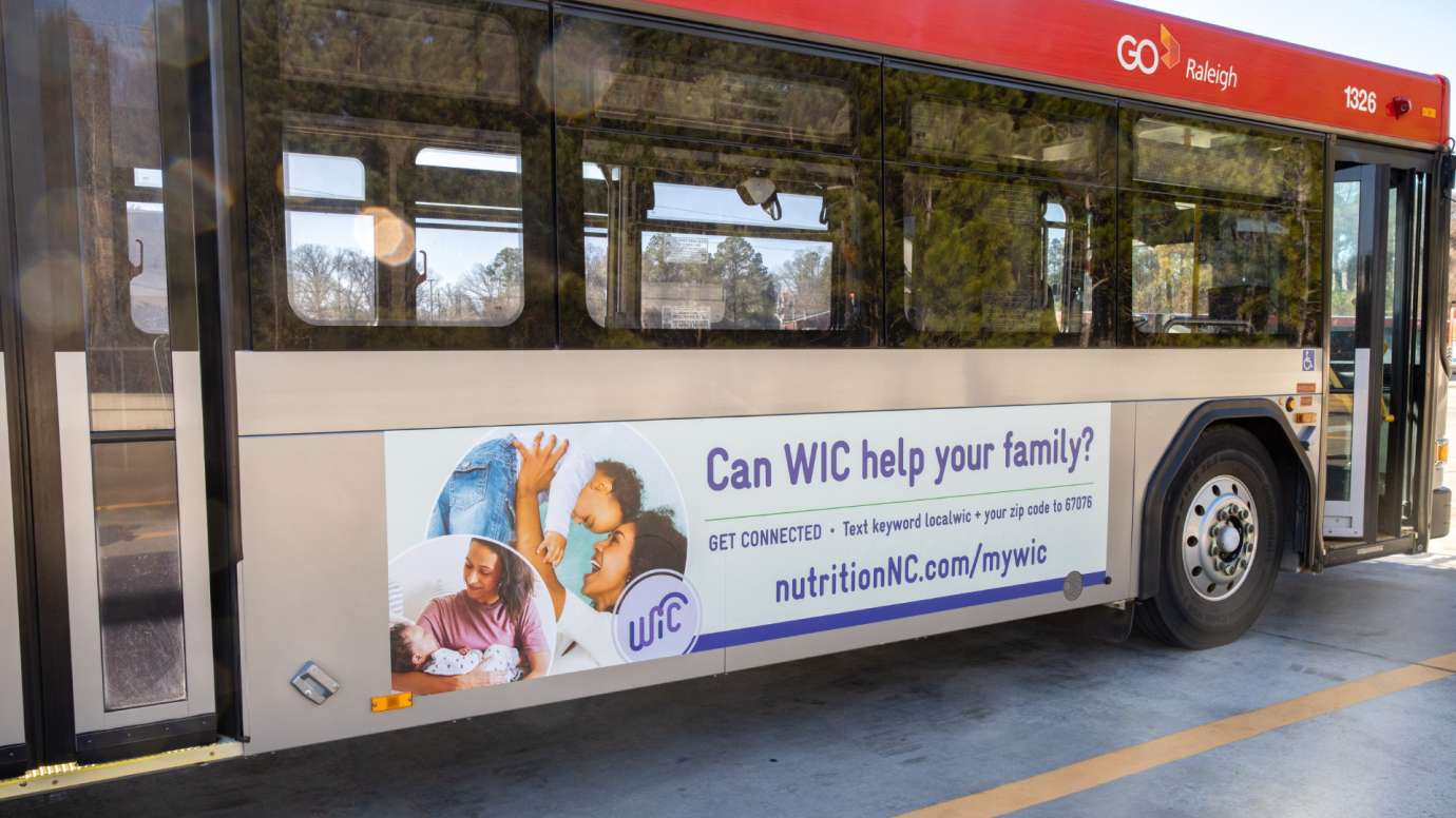 GoRaleigh bus with ad for WIC - Family Assistance Program