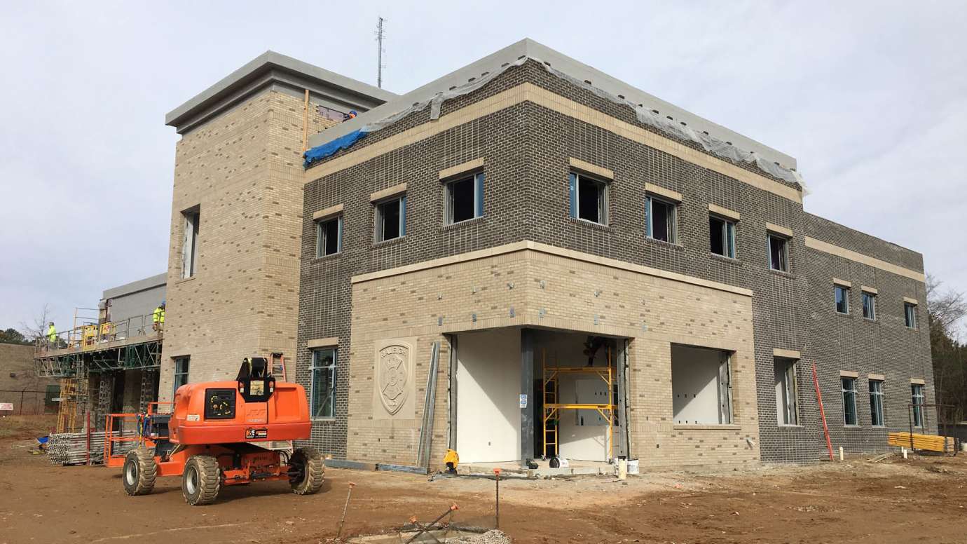 Fire Station 22 under construction with concrete exterior almost finished 