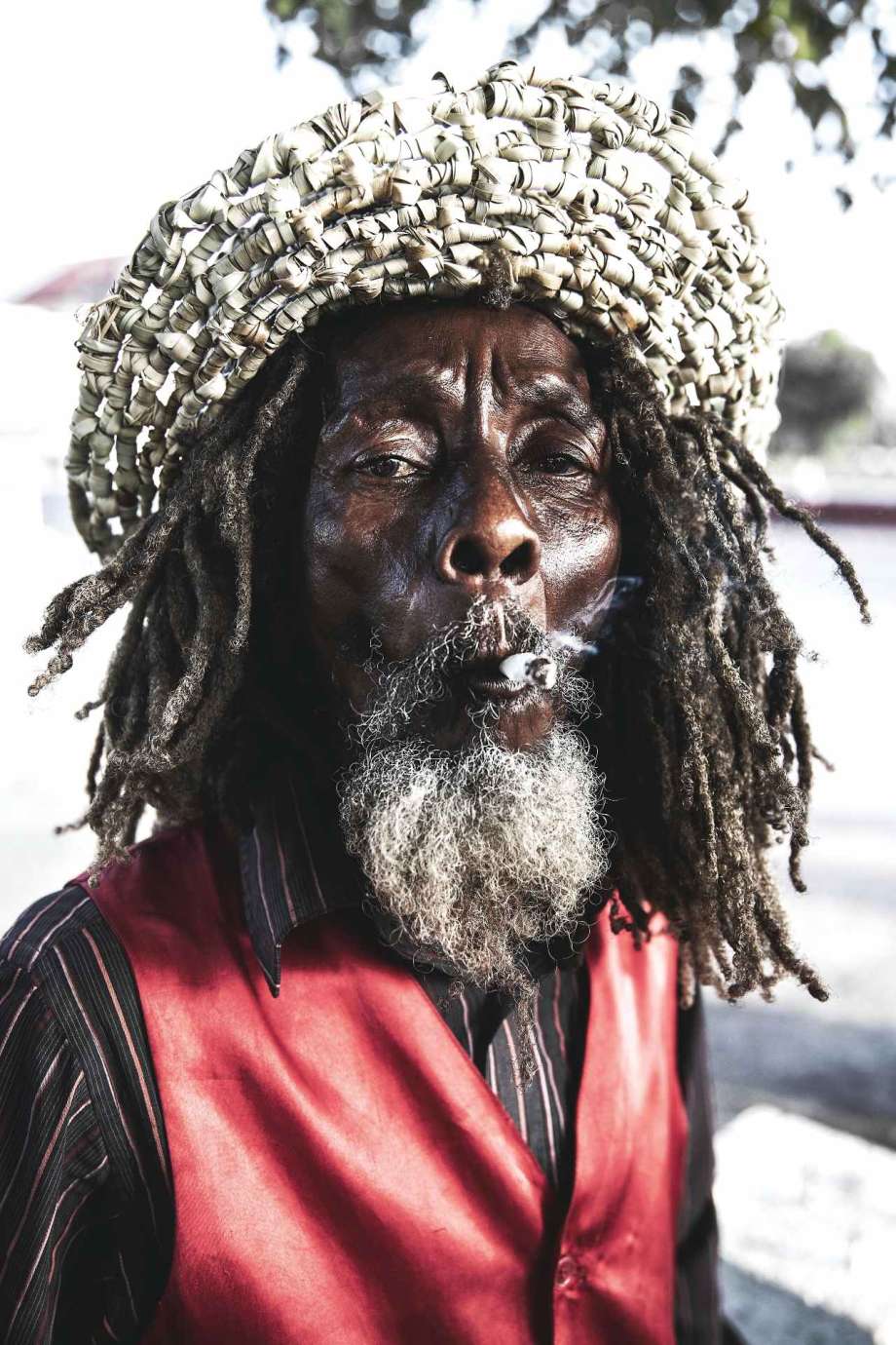 A photograph of a man smoking by artist Samantha Everette