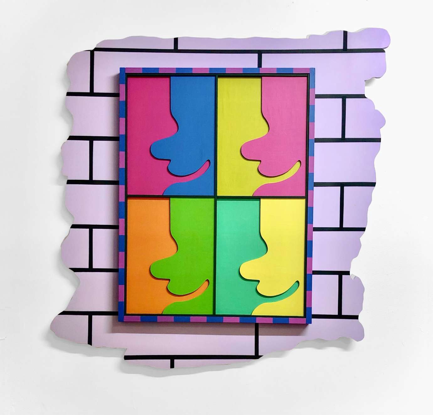 3D artwork of a grid of colorful portrait like shapes hanging on a purple brick wall by Jerstin Crosby