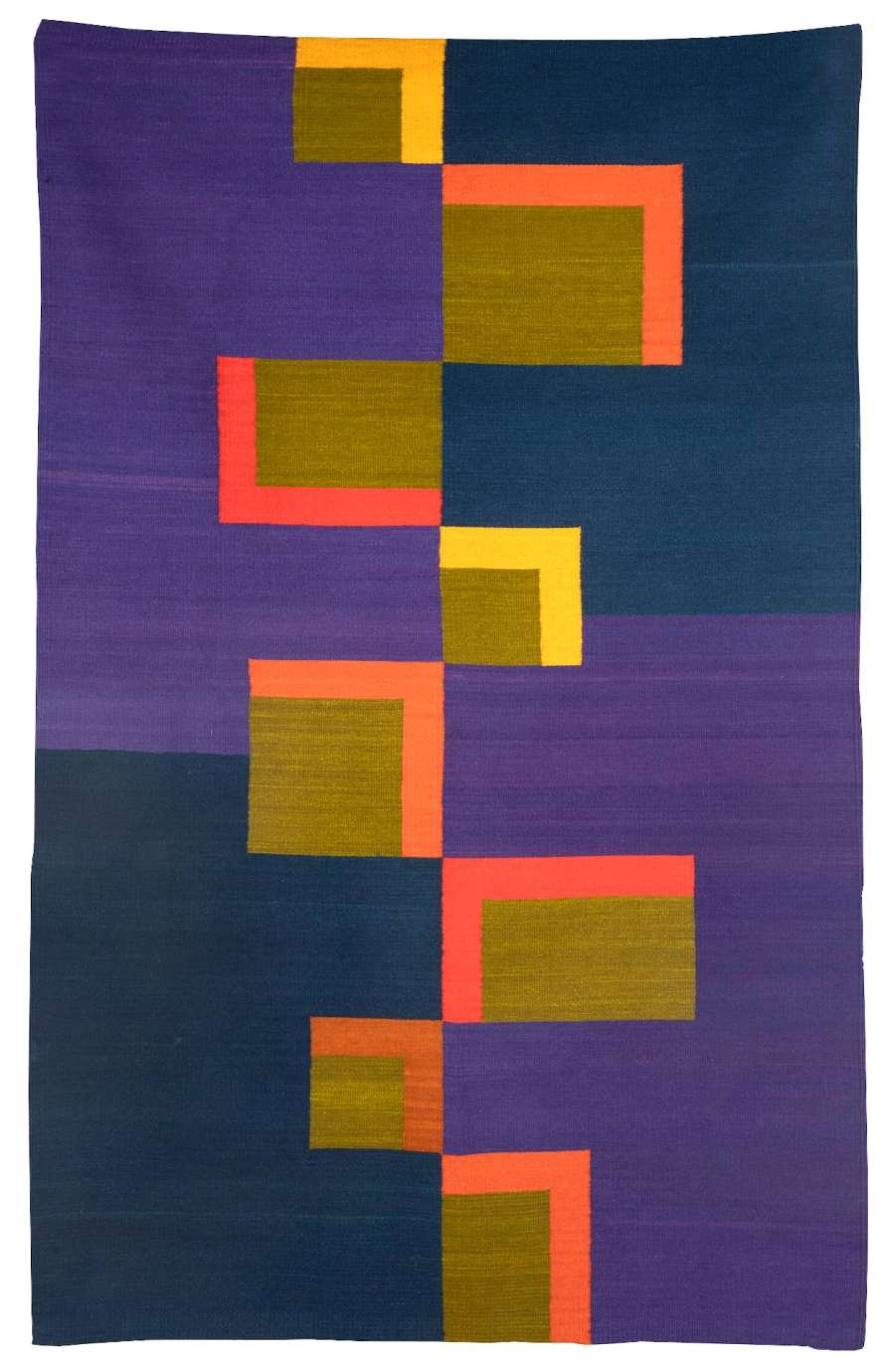 A deep blue and purple textile with a red, yellow, and brown staggered box design down the middle by Martha Clippinger