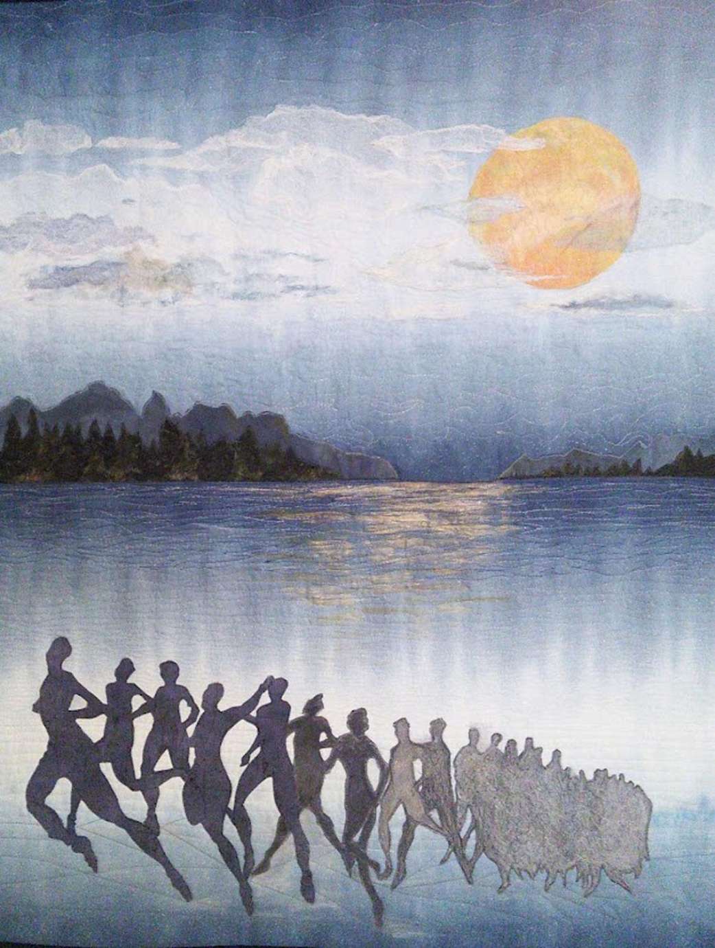 A quilt depicting a night sky over a lake with an orange moon in the background and a group of shadow people running up the bank