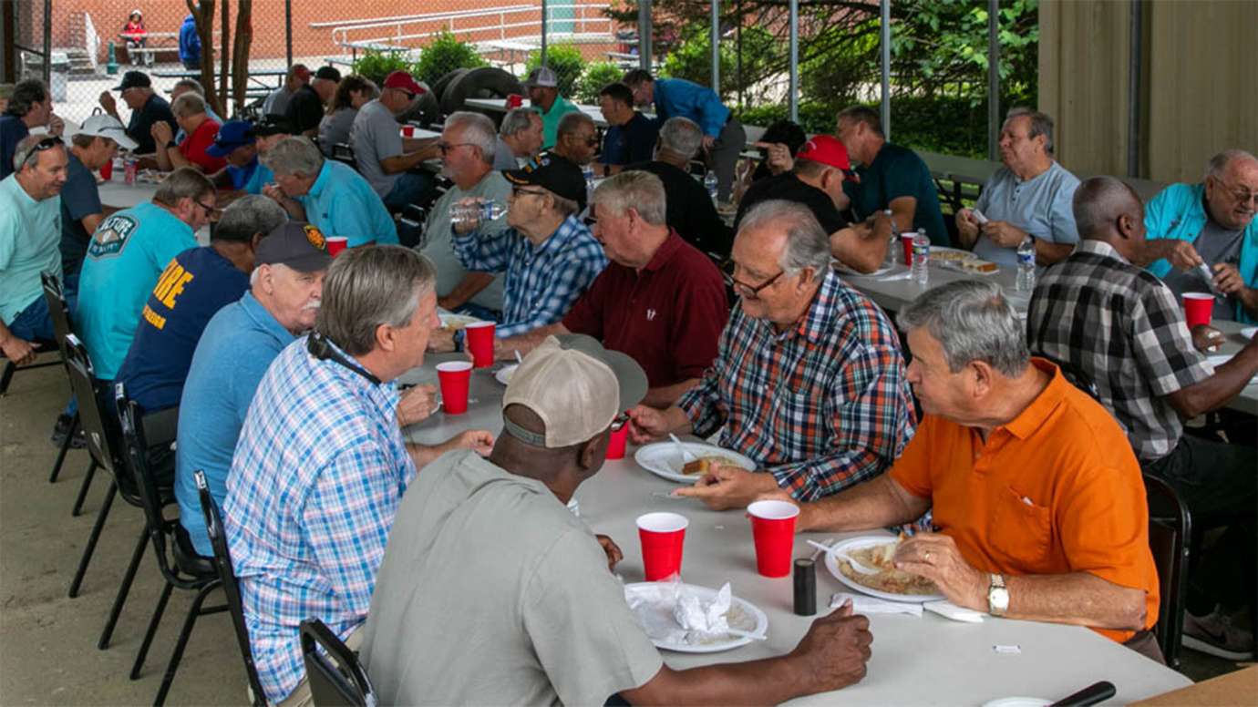 Raleigh Fire Department enjoys eating lunch together during retirement luncheon