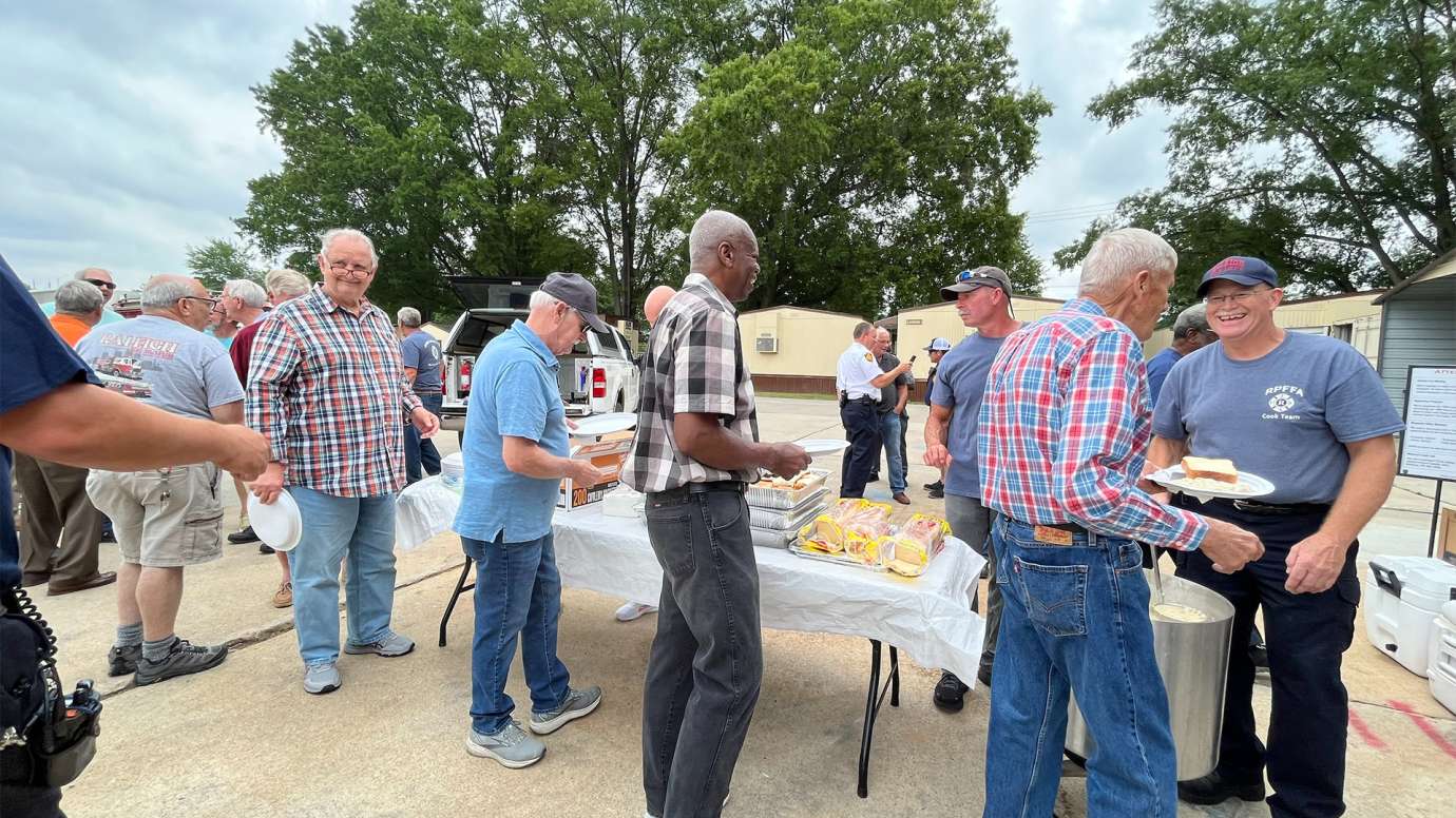 Raleigh Fire Department serving food during retirement luncheon