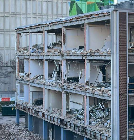 The Old Police Building being demolished the whole back wall of buiding is missing. 