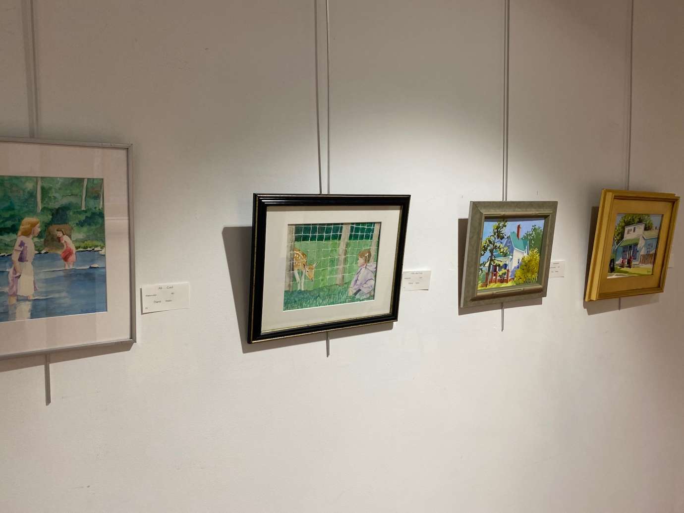 Sertoma Park Artist Association Exhibition - paintings hanging on wall