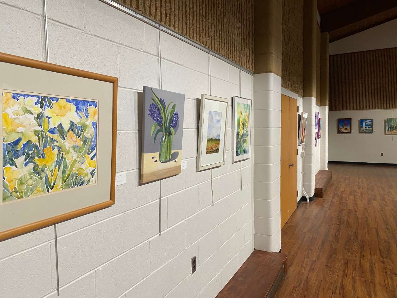 Sertoma Park Artist Association Exhibition - paintings hanging on wall