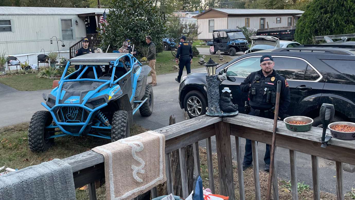 Officers assist homeowners in a trailer park