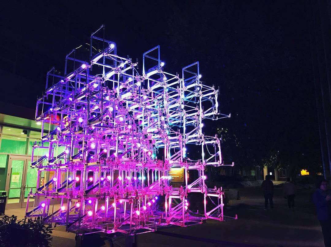 Colorful light cube installation at Illuminate Art Walk